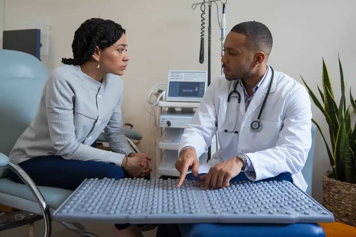 a doctor explaining the side effects of using pemf therapy