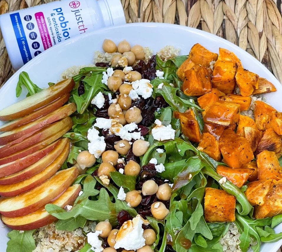 a plate of food on a wicker surface