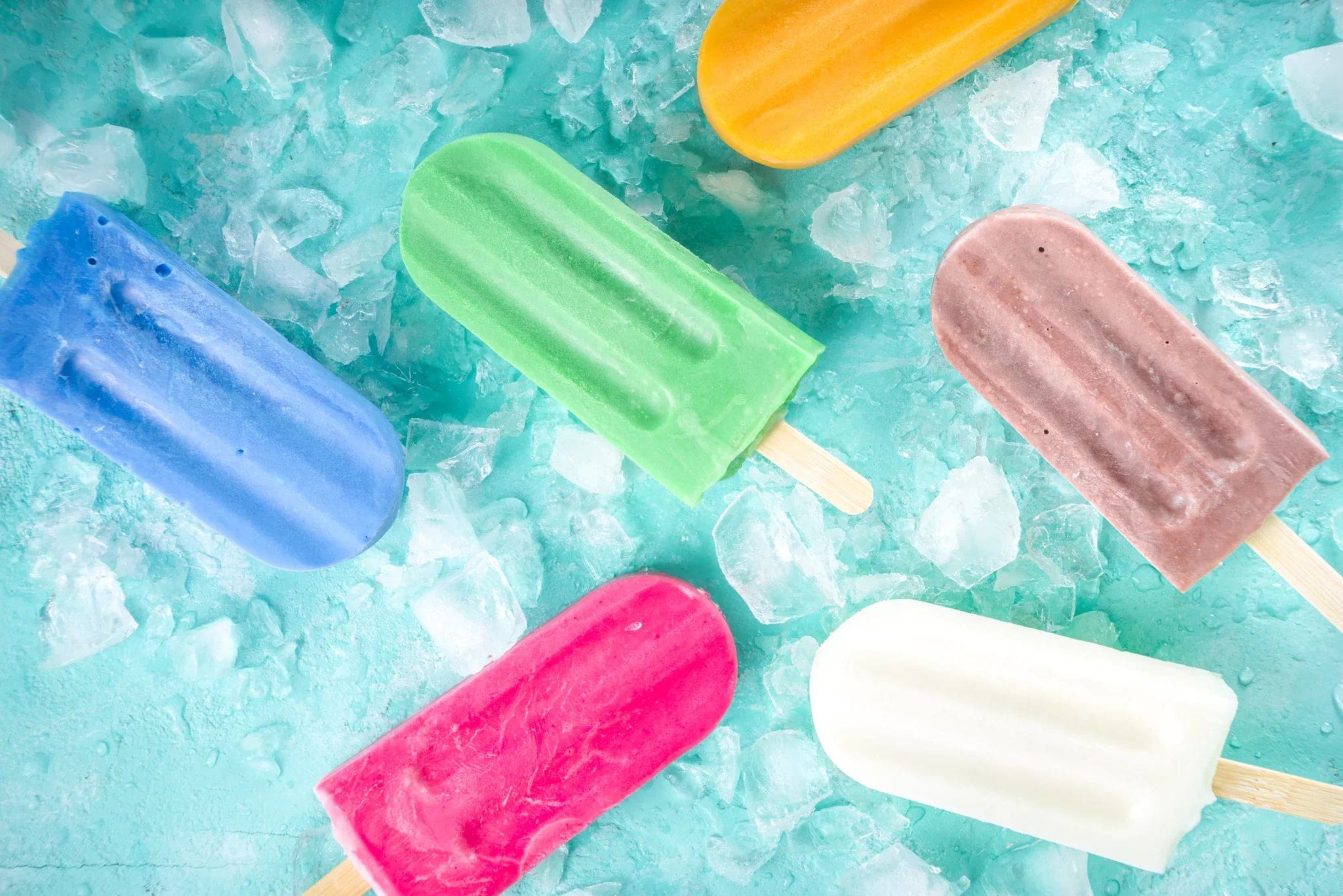 a group of popsicles on ice