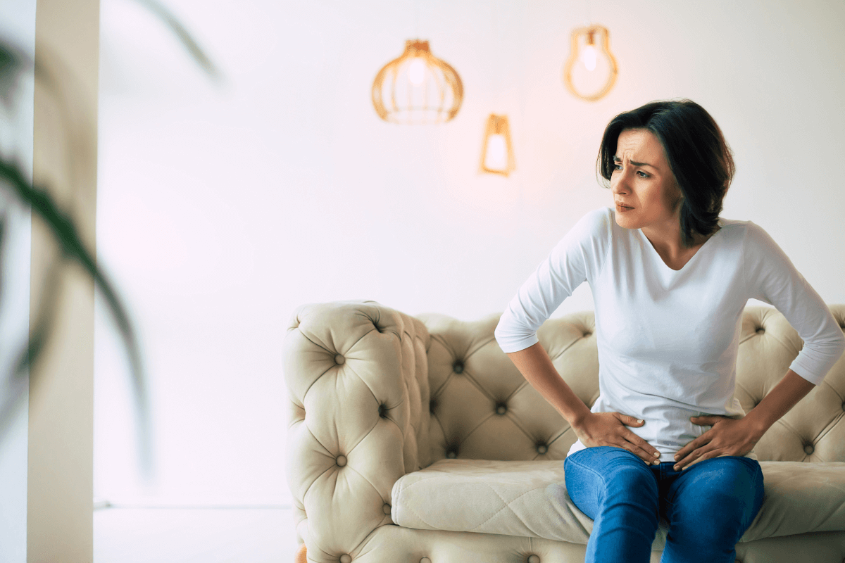 A conceptual image showing probiotic capsules and beneficial bacteria, representing relief from IBS symptoms.