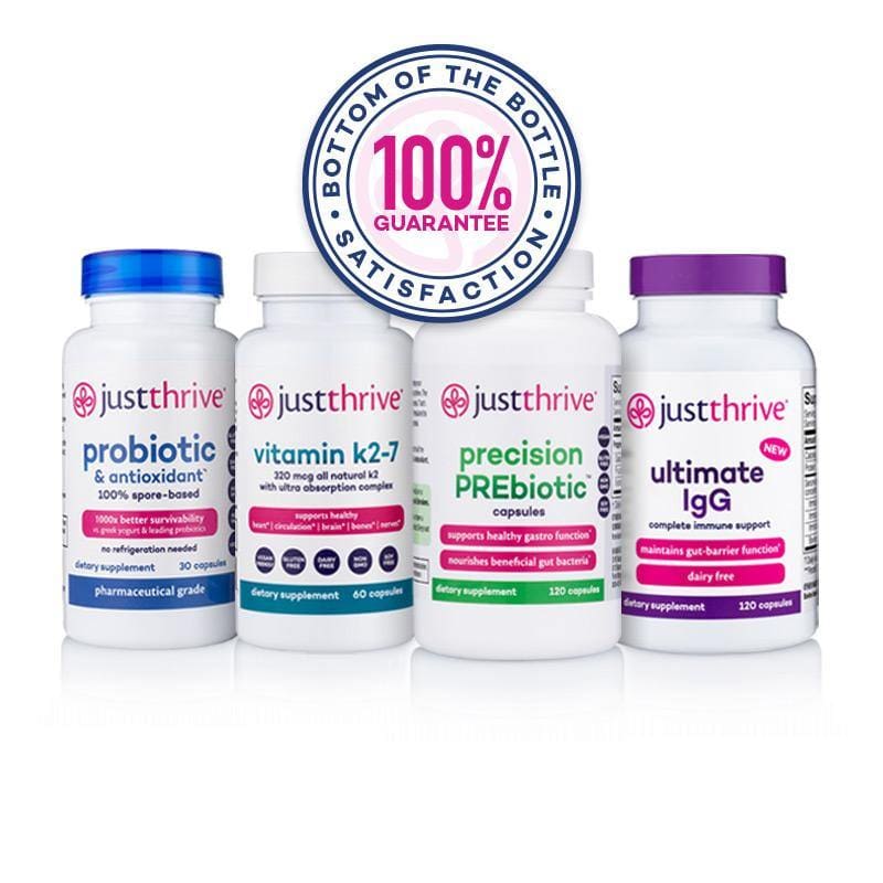 a group of white bottles with blue and purple labels